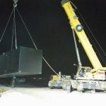 40 foot underground gun vault installation at night